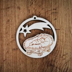 Drevená vianočná ozdoba s gravírovaným spiacim Ježiškom a vyrezanou padajúcou hviezdou.